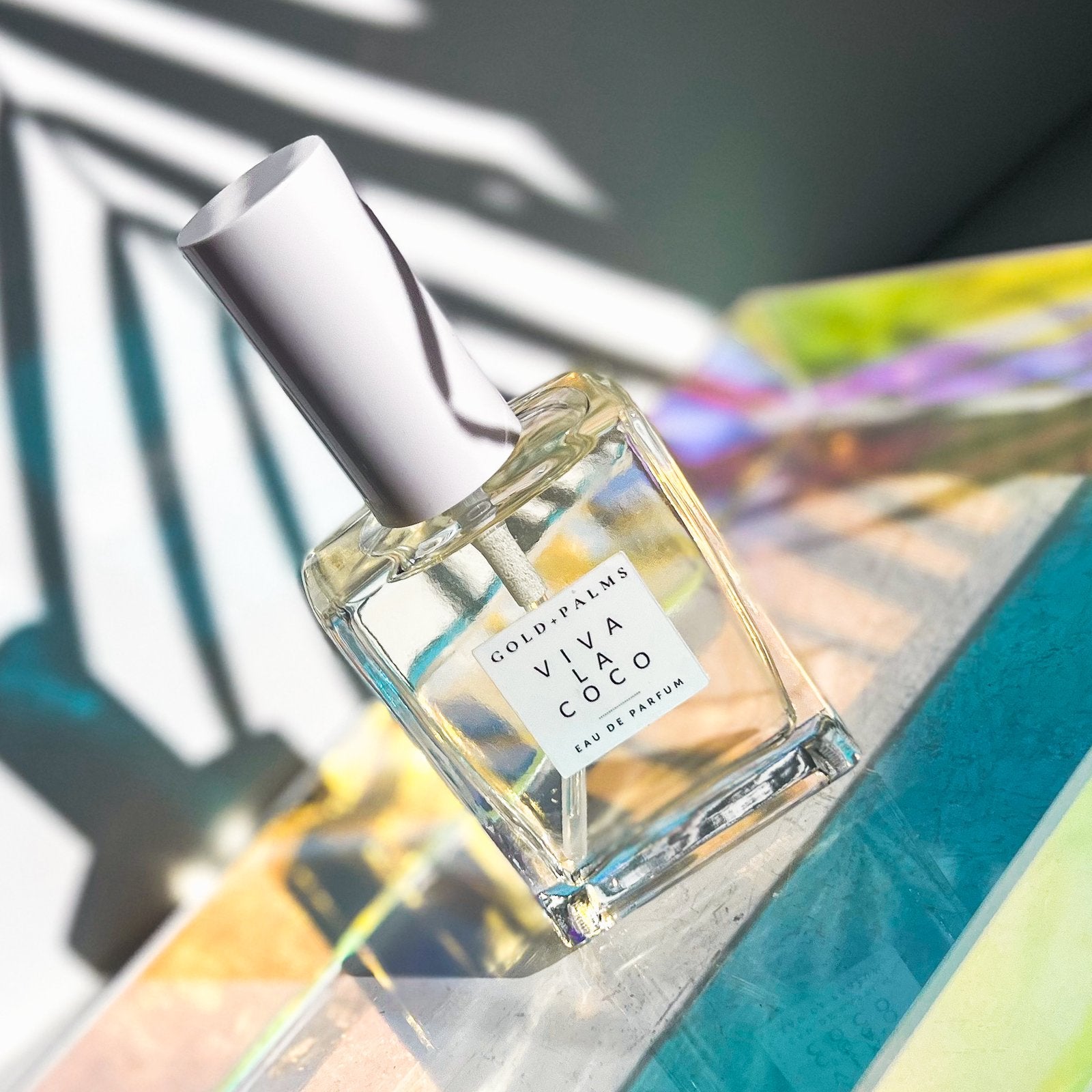 50ml gender neutral vanilla coconut fragrance on a colored counter top