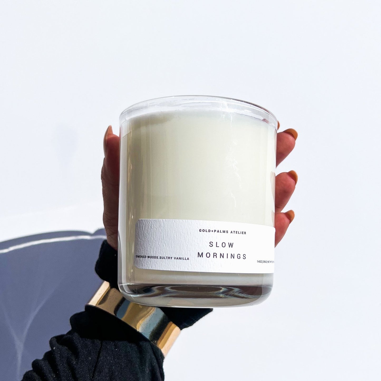 smoked woods and vanilla soy wax candle with a white background 