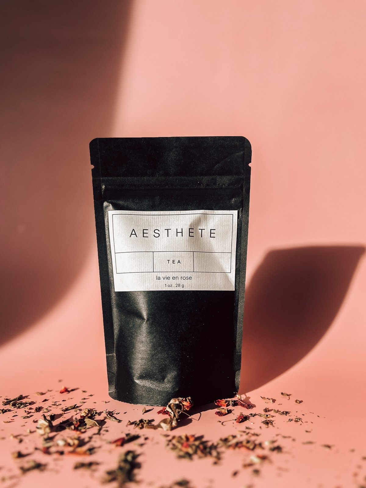 aesthete tea la vie en rose against pink background