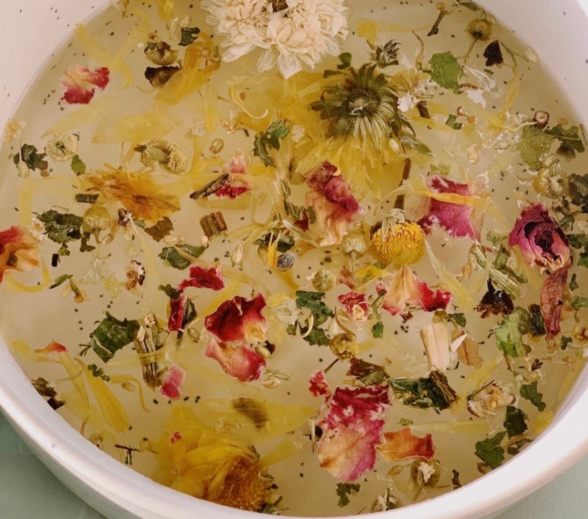 facial steam dried flowers and herbs in water